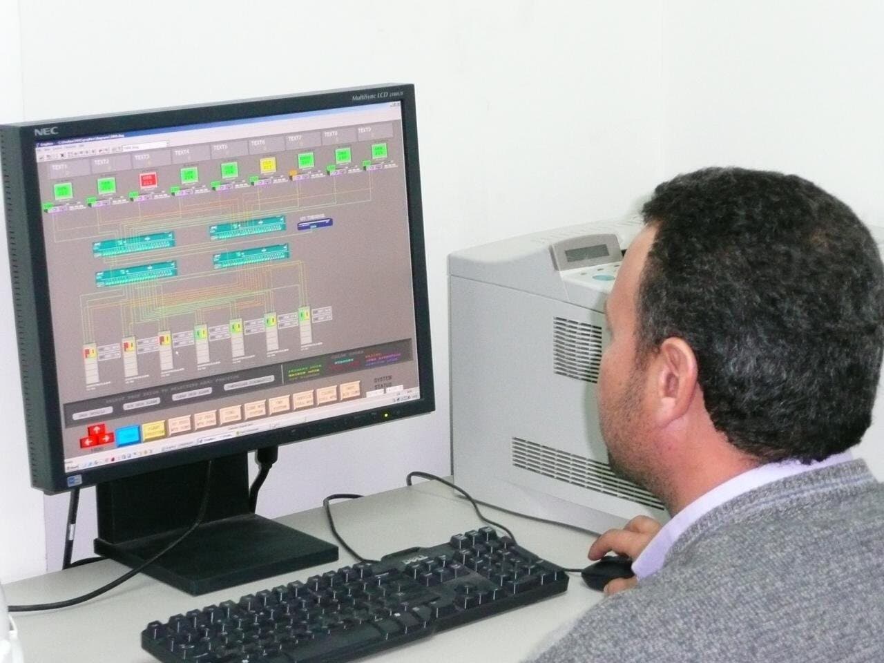 Engineer at a DCS operator workstation